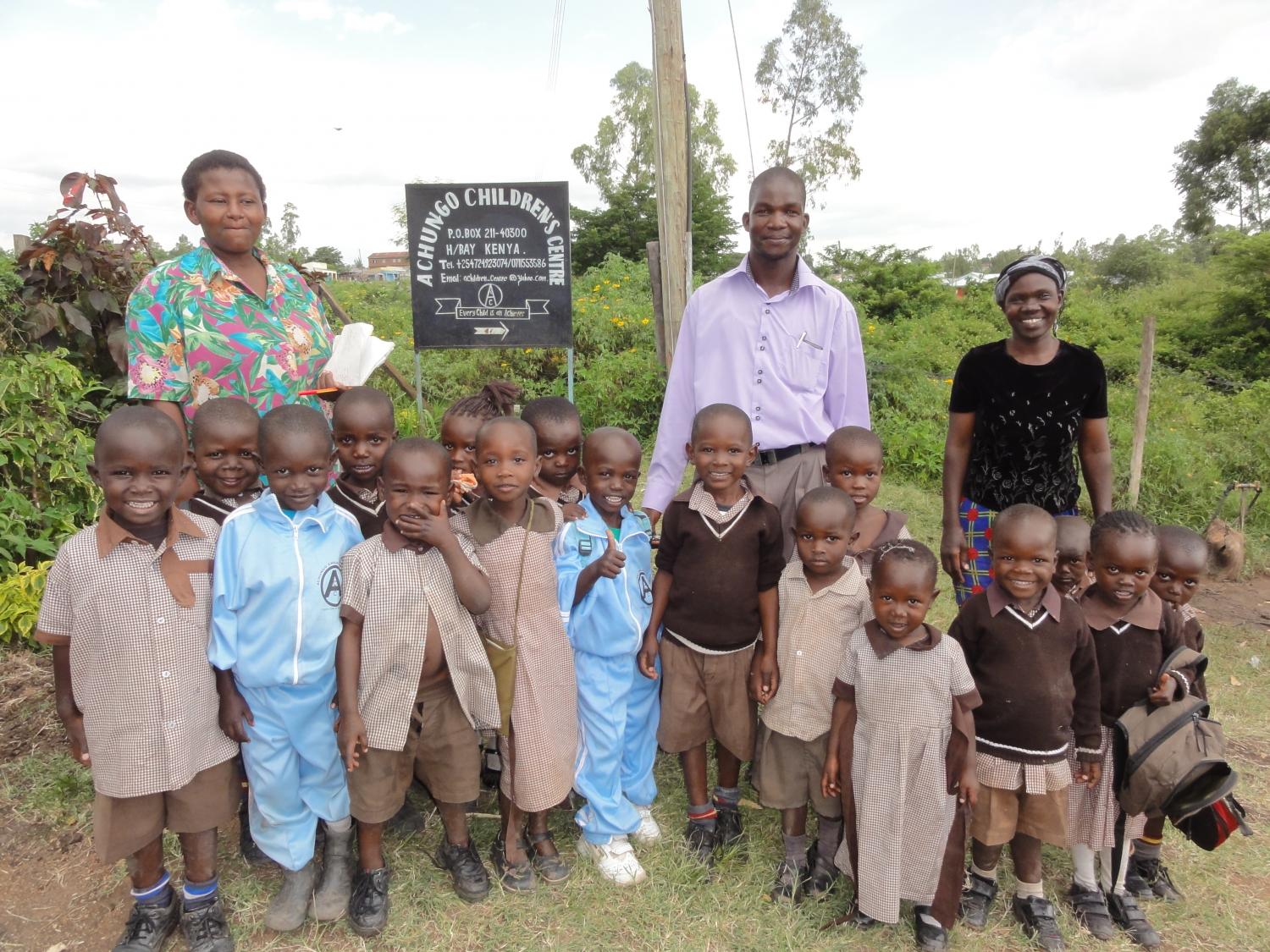 Michael Nyangi and some of the children at the Achungo Community Center