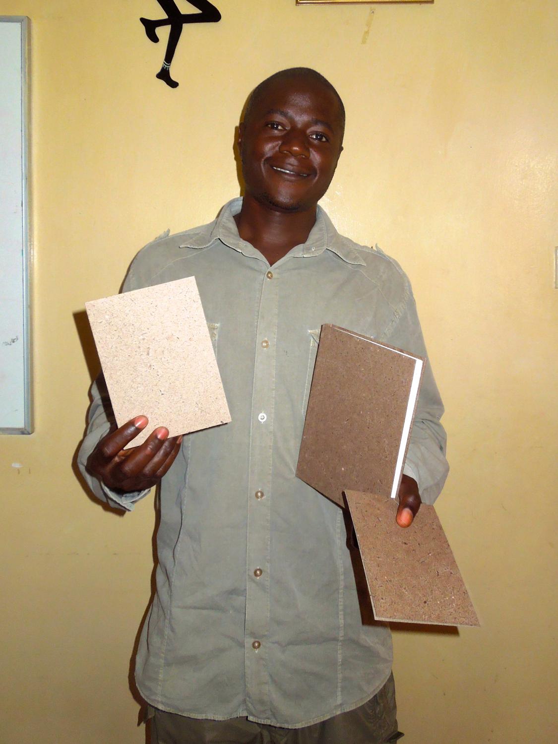 Michael (Kiva Zip Borrower) with some of the products he has developed
