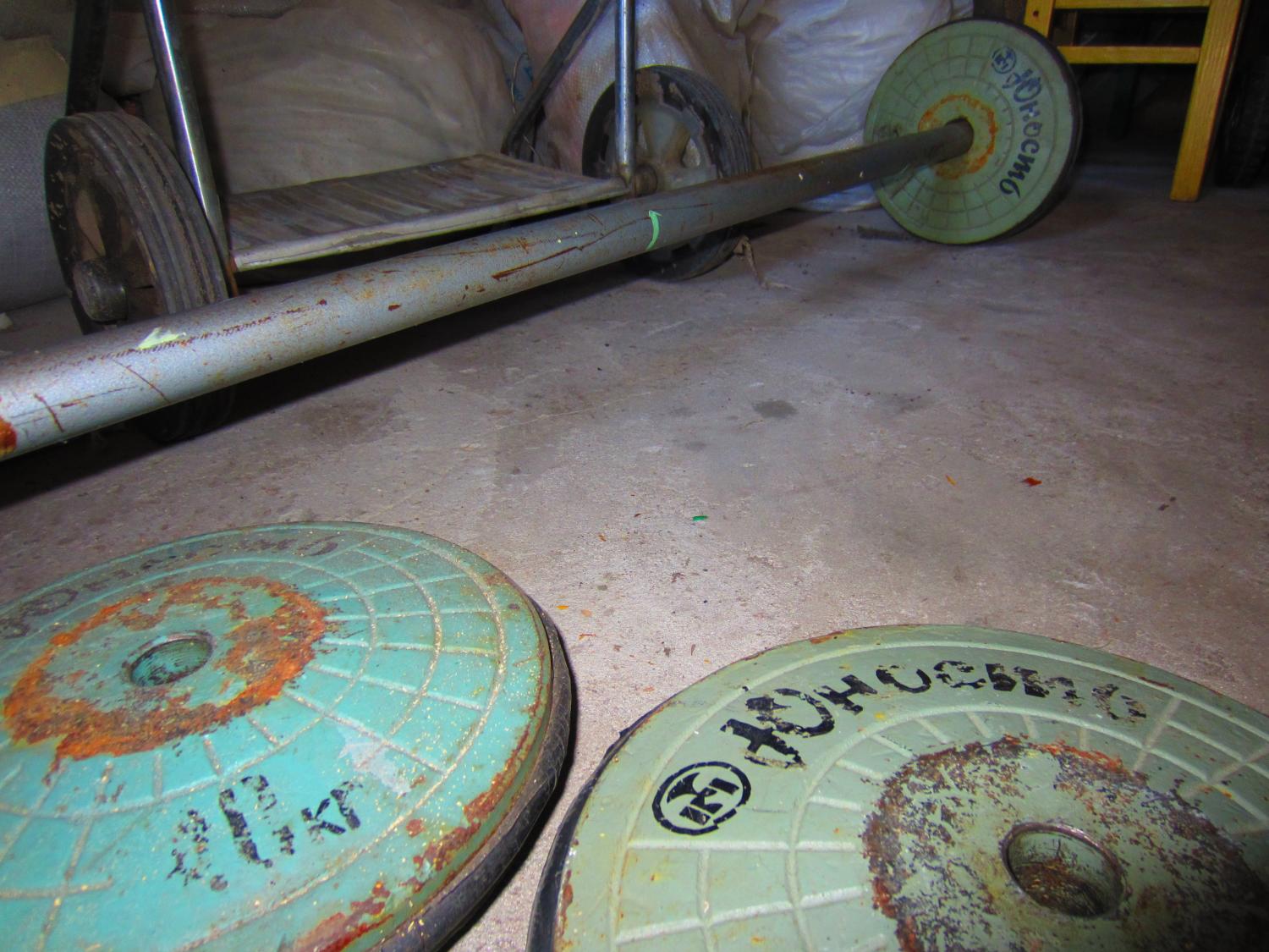 Old Soviet weights that Vasiliy used to use. After a few days working out with these babies, I felt like Ivan Drago from Rocky IV.