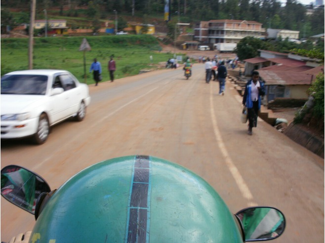 View from the back of a moto taxi in Kigali, Rwanda. You better hang on!