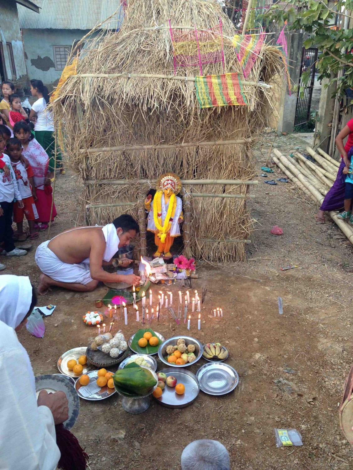The Brahmin preparing the hut for burning