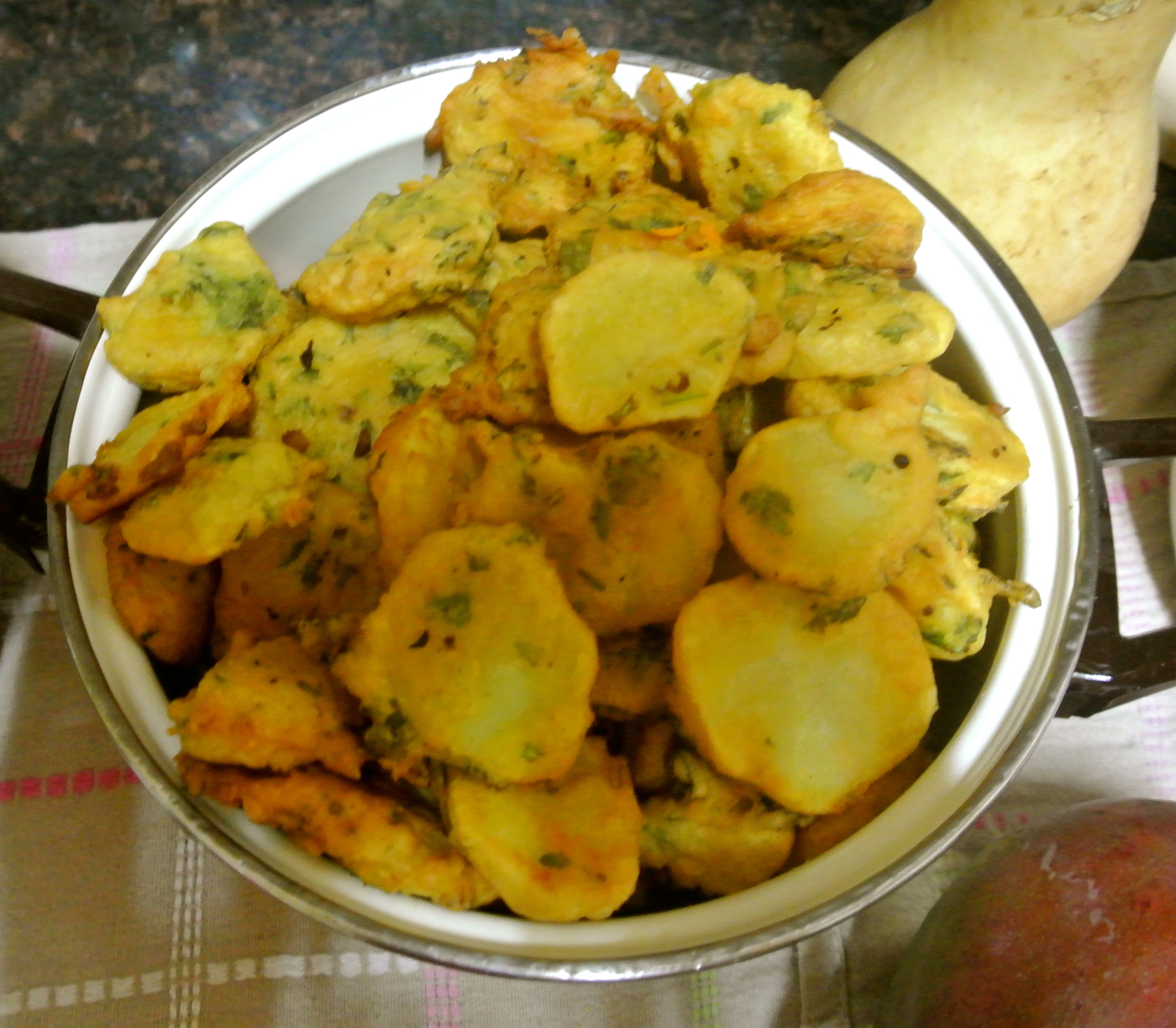 Bajias – Potatoes dipped in a lentil flour spiced with coriander and cilantro. Yes, I said battered fried potatoes. Also, completely delicious.