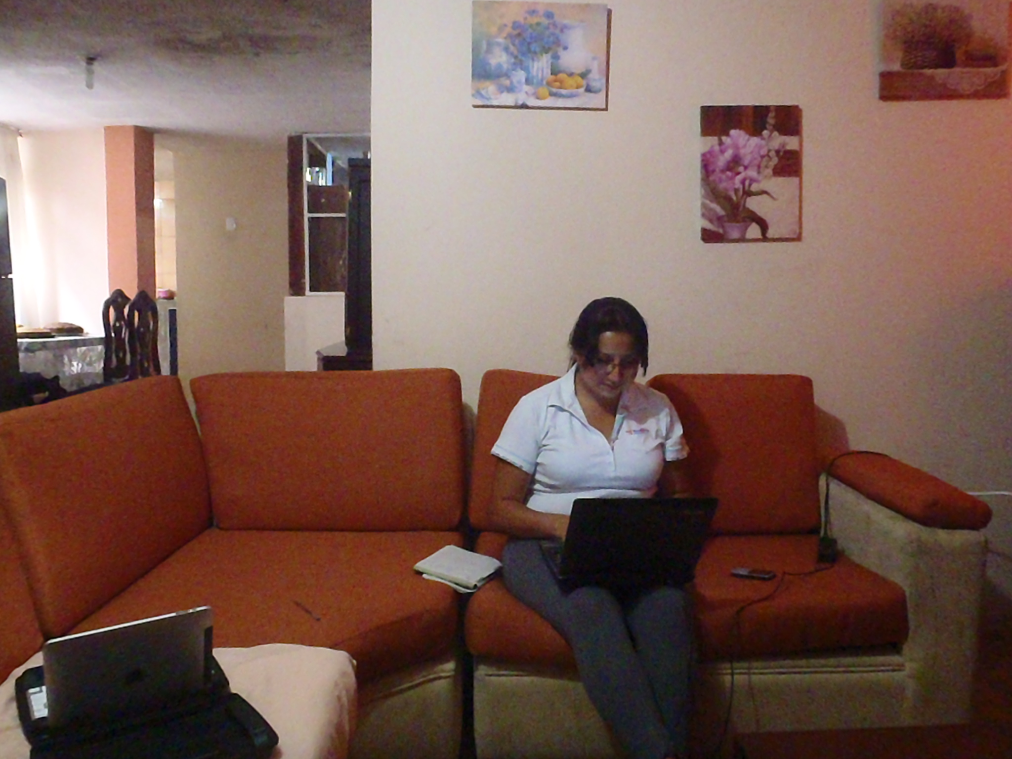 Ivonne prepping reports from home.