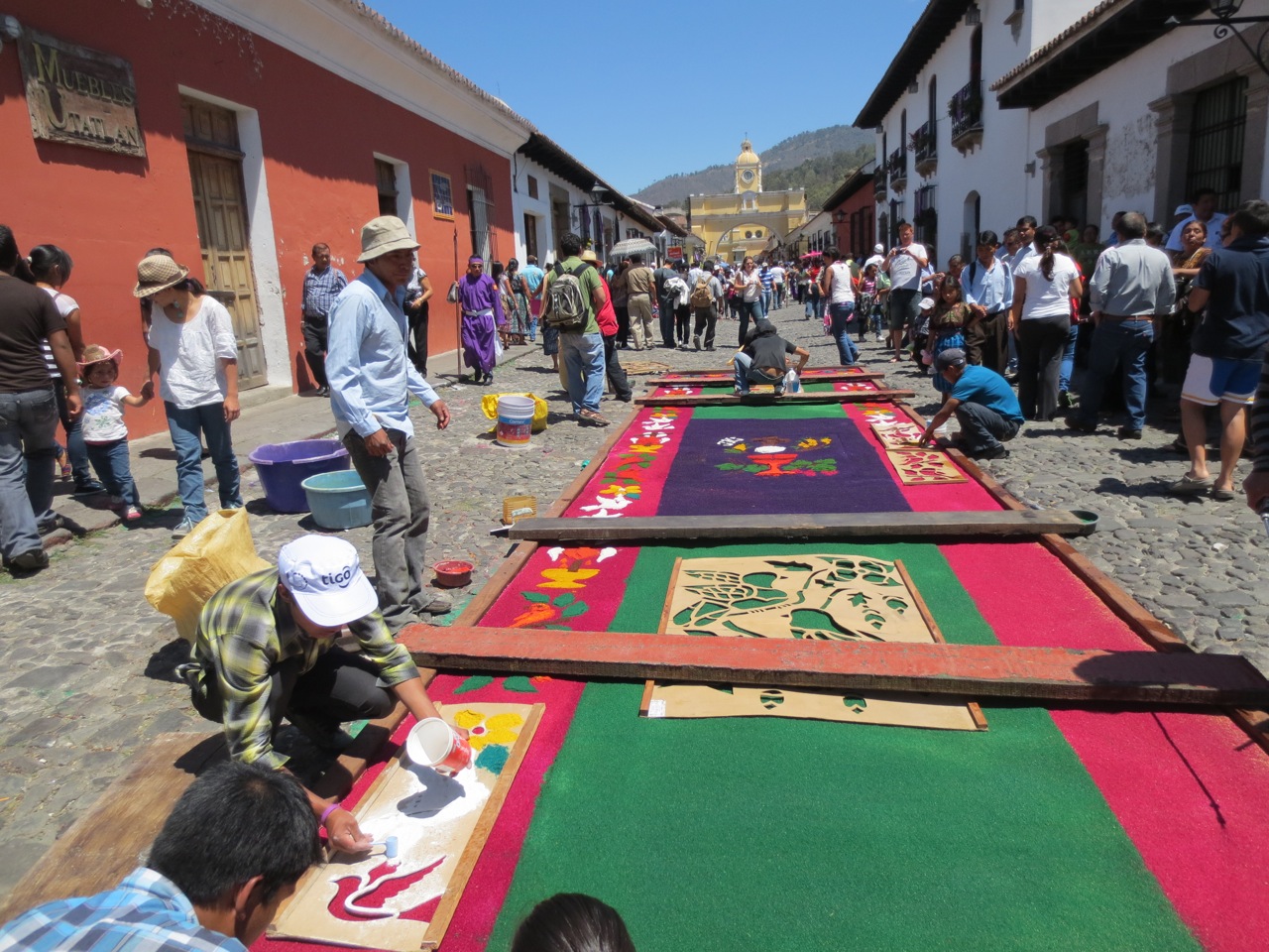 Another sawdust alfombra being created on the cobblestone streets of Antigua