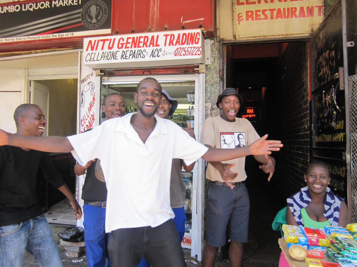 Walking through Yeoville in downtown Joburg, these guys aked me to take their picture.