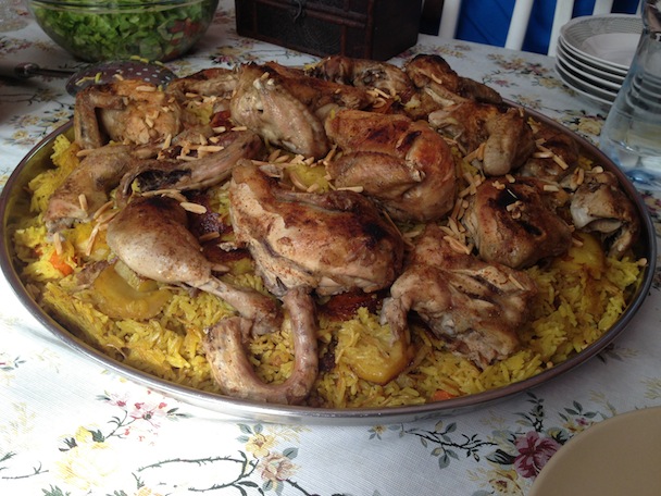 Maqloobeh, a traditional Palestinian dish with chicken, rice, and vegetables