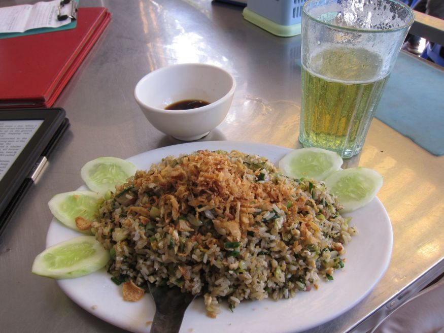 Com Rang Bo: beef fried rice, served here with dried shallots and cucumbers. And of course, this meal isn't complete without bia hoi.