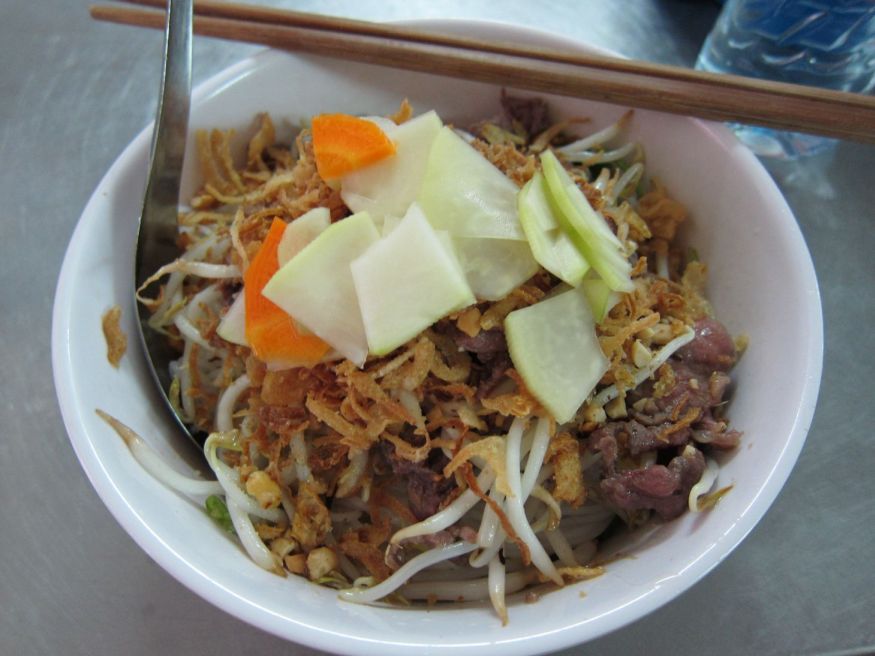 Bun Bo Nam Bo: thin rice noodles with stir fried beef, bean sprouts, cucumbers, lettuce, dried shallots, and peanuts.