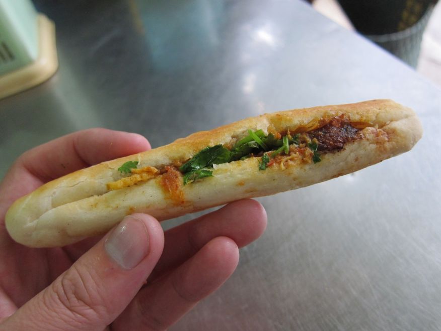 Banh My: literally translating to "bread", these sandwiches come in a wide variety depending on how the vendor decides to prepare them. What is this, banh my for ants? (It still tasted good.)