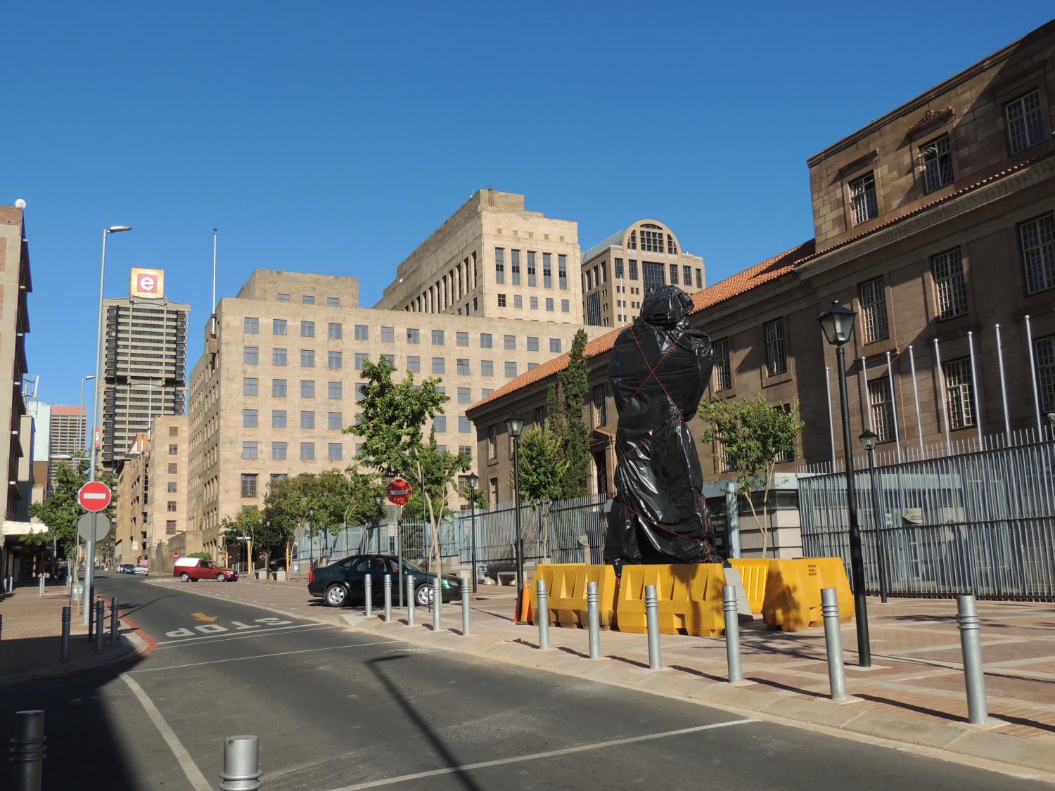 Across the street from Chancellor House is a new statue waiting to be unveiled this month. I hear that it's Nelson Mandela boxing. Chancellor House, where Mandela and Oliver Tambo practiced law, was recently restored.