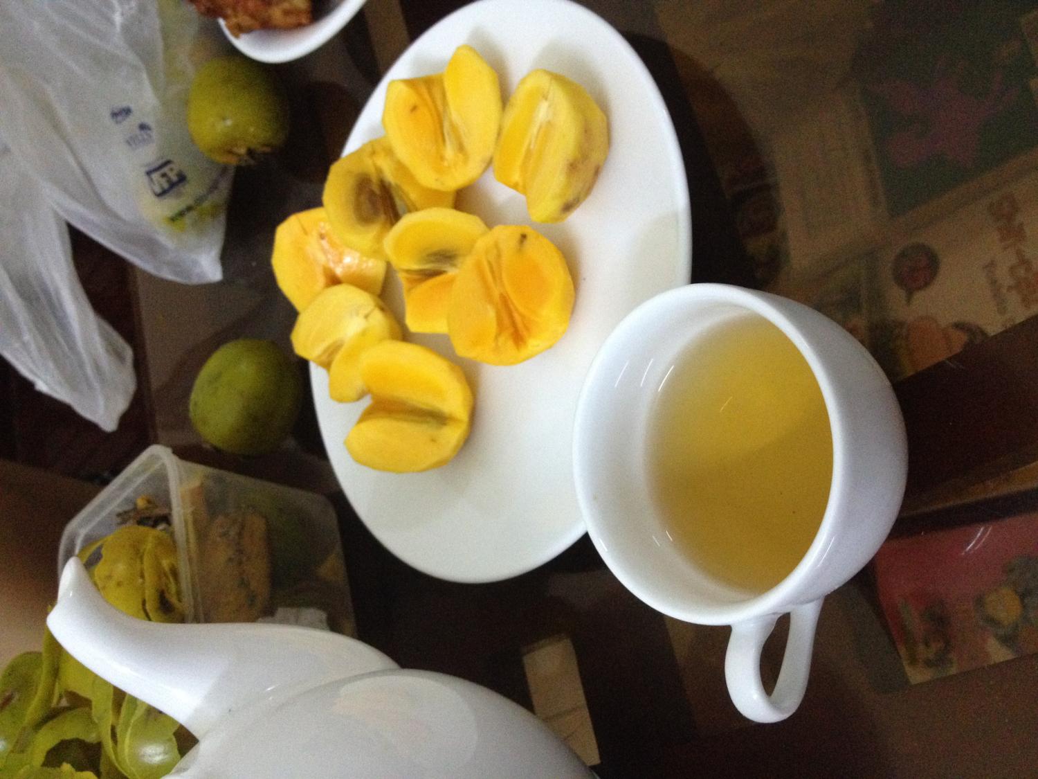Autumn fruit with green tea