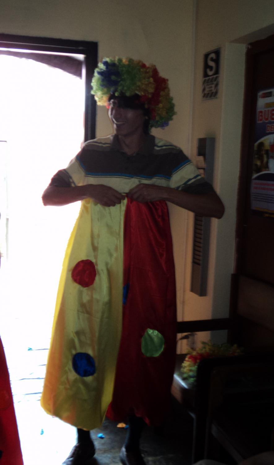 In addition, Harris plays the role of a clown in holiday shows held for children of staff at EDAPROSPO. (He asked me to include this photo.)