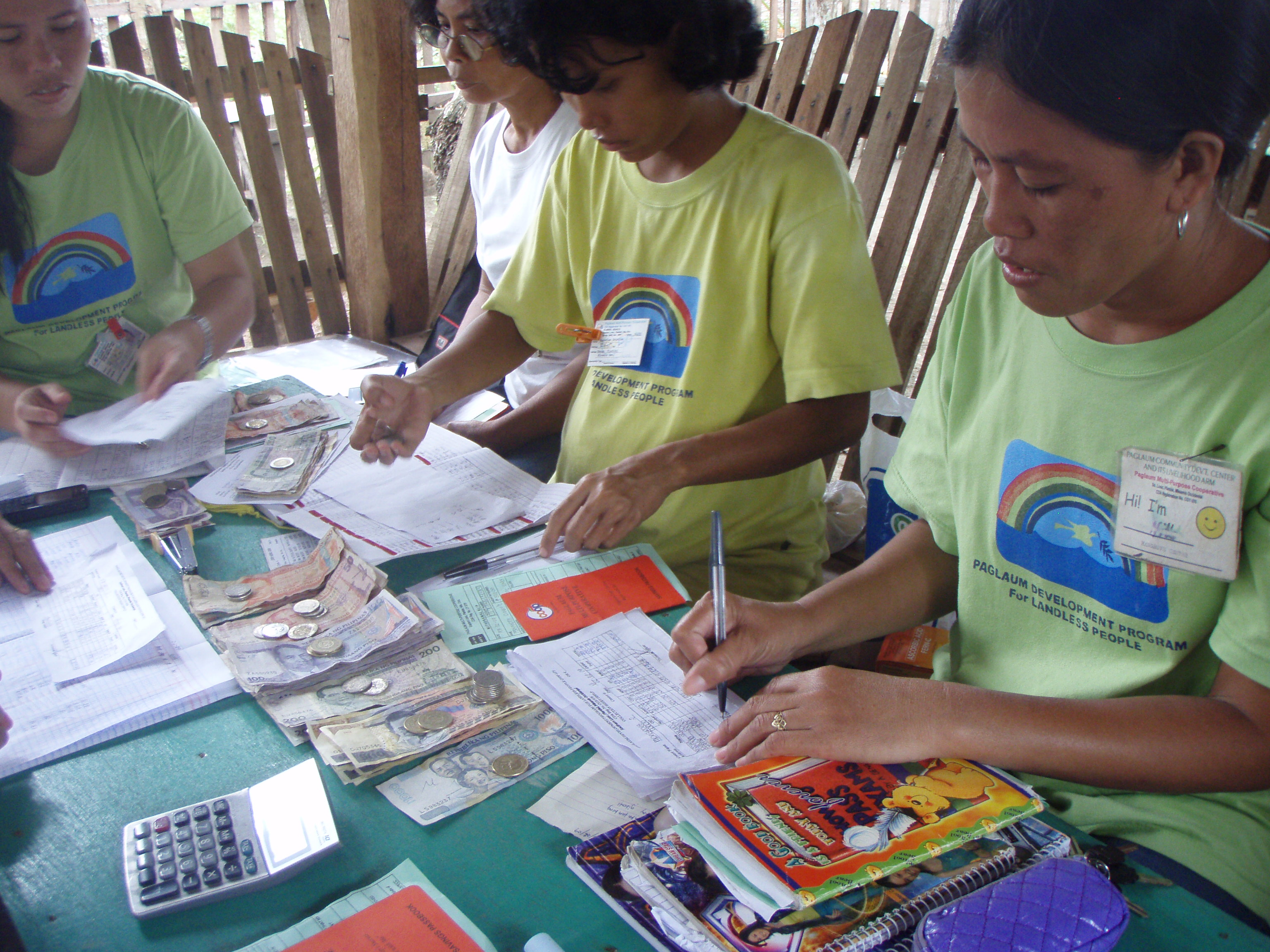 Nita Morequio counting repayments Chapter Leader, Treasurer & Auditor counting pepayments