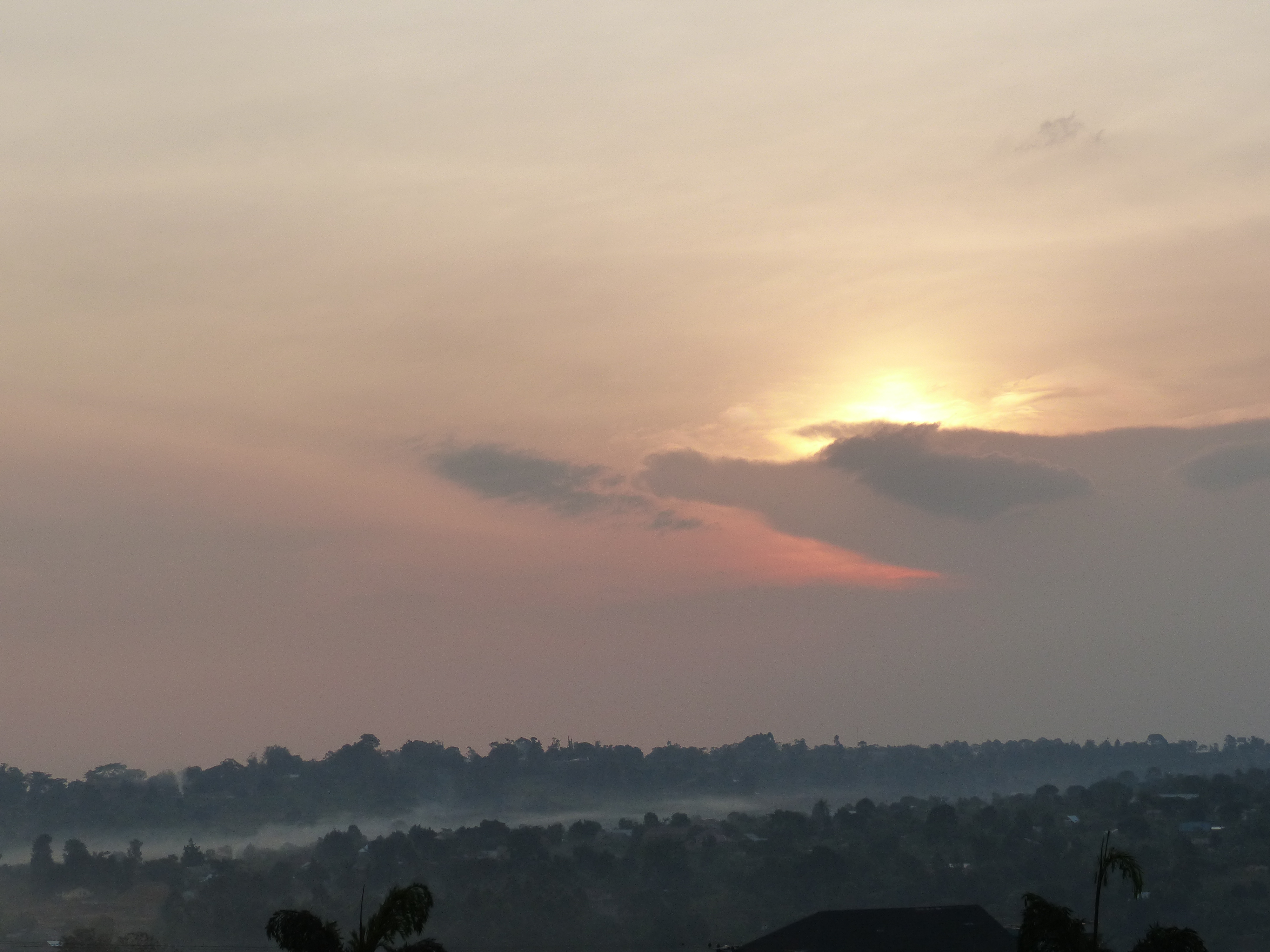 Masaka sunrise with my cup of Nescafe instant coffee
