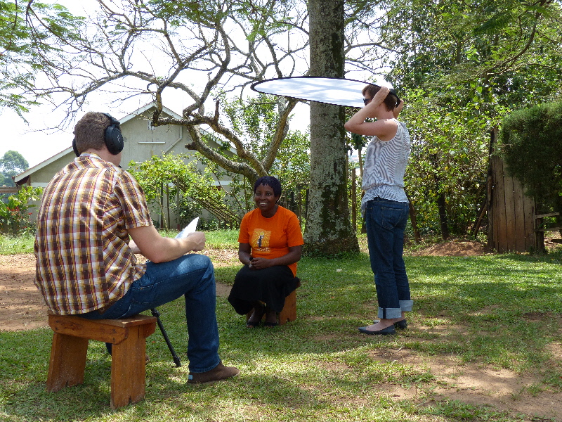 interviewing Cathy outside Eva's house