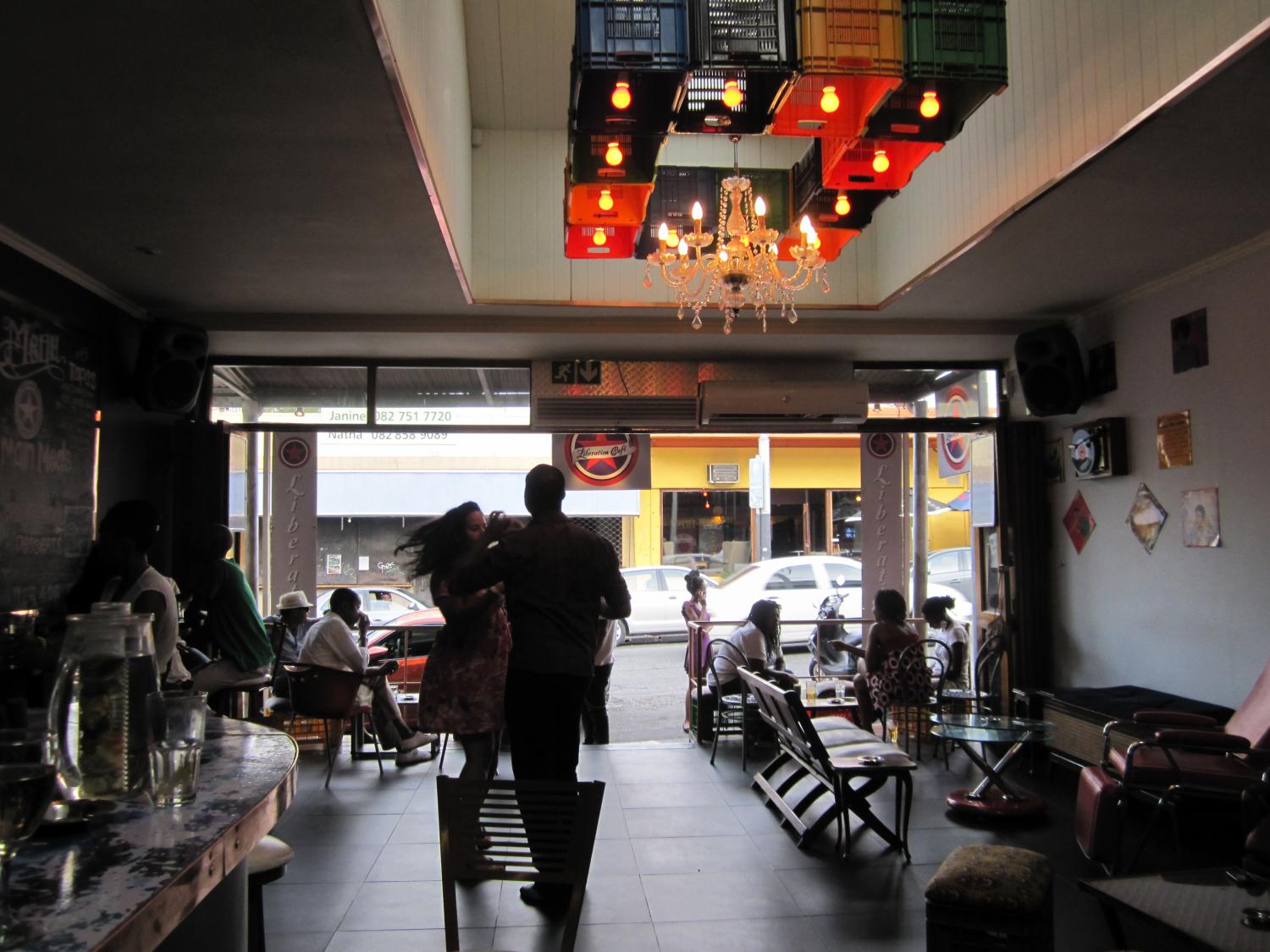 Salsa dancing in Melville, a suburb where shops, restaurants, and bars line the streets unlike the Northern suburbs where they exist in enclosed malls