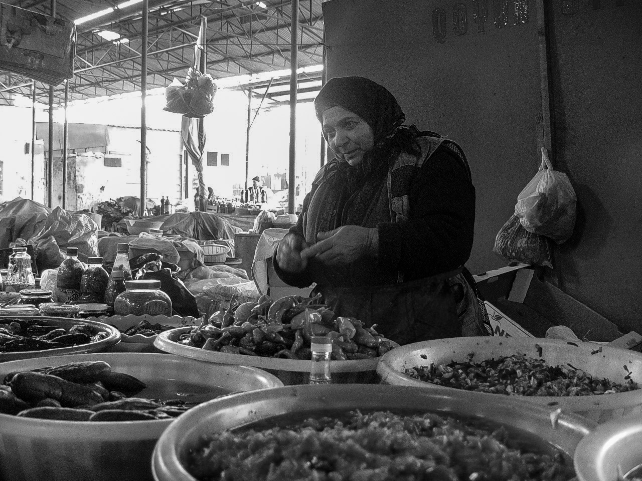 Almas has been running this produce stand since 1982. Her husband used to work as a repair man, but due to an injury had to stop. They opened the stand together and after one year Almas ran it on her own. He now manages the loan and she runs the store. During the winter, she makes pickled produce. In the Spring, she sells fresh vegetables as they grow abundantly in Azerbaijan.