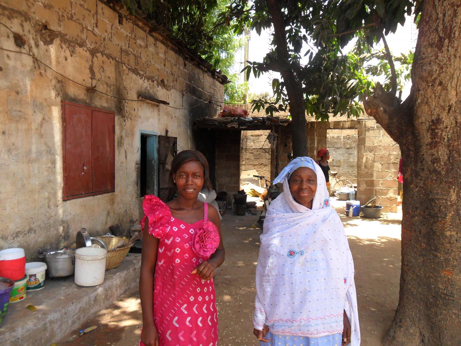 Mother and daughter CAURIE borrowers, Fautou and Sylla in Senegal. Fatou took her last loan to help her son open a small shop.