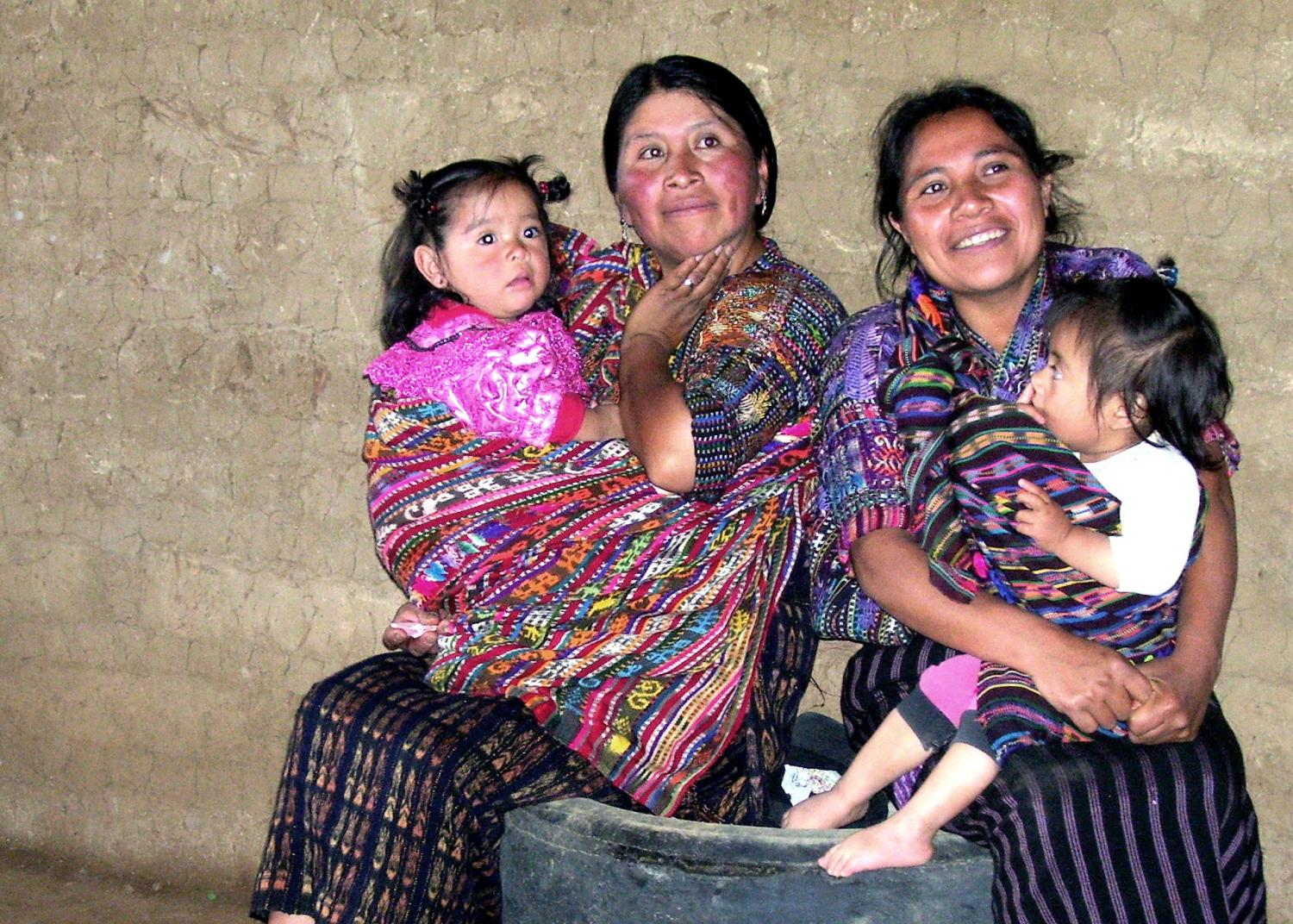 The "Good Samaritans" trust bank meets once a month to make loan repayments and receive financial education training. These indigenous mothers support their families through weaving, planting, and raising farm animals with a loan from Friendship Bridge. Jeffrey Nelson, Guatemala