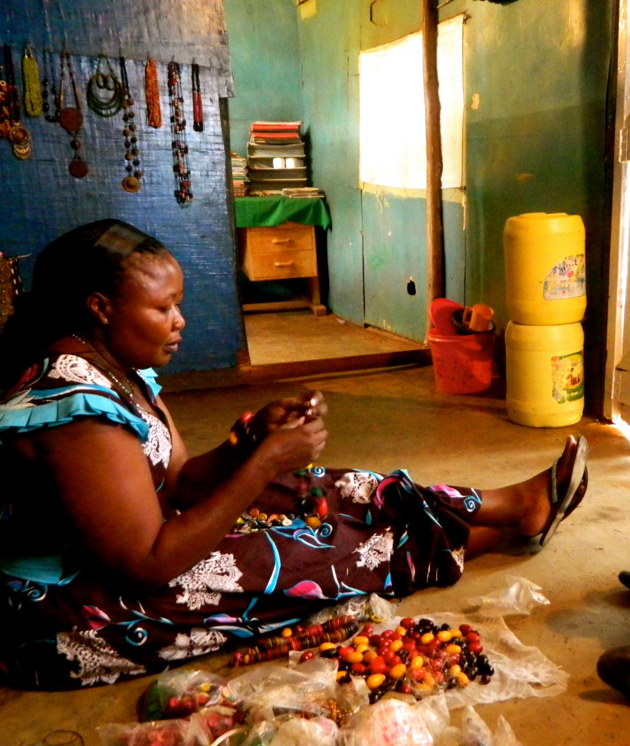 Pamela, a mother of four, sits on the floor of her shop in the Kibera slum in Nairobi. She has received two loans from Kiva Zip to add stock to her shop which have helped to increase her revenue by over 50%. Pamela runs an organization that provides vocational training to widows and at-risk women, many of the whom see her as a mother to the whole community. Rachel Davis, Kiva Zip, Kenya