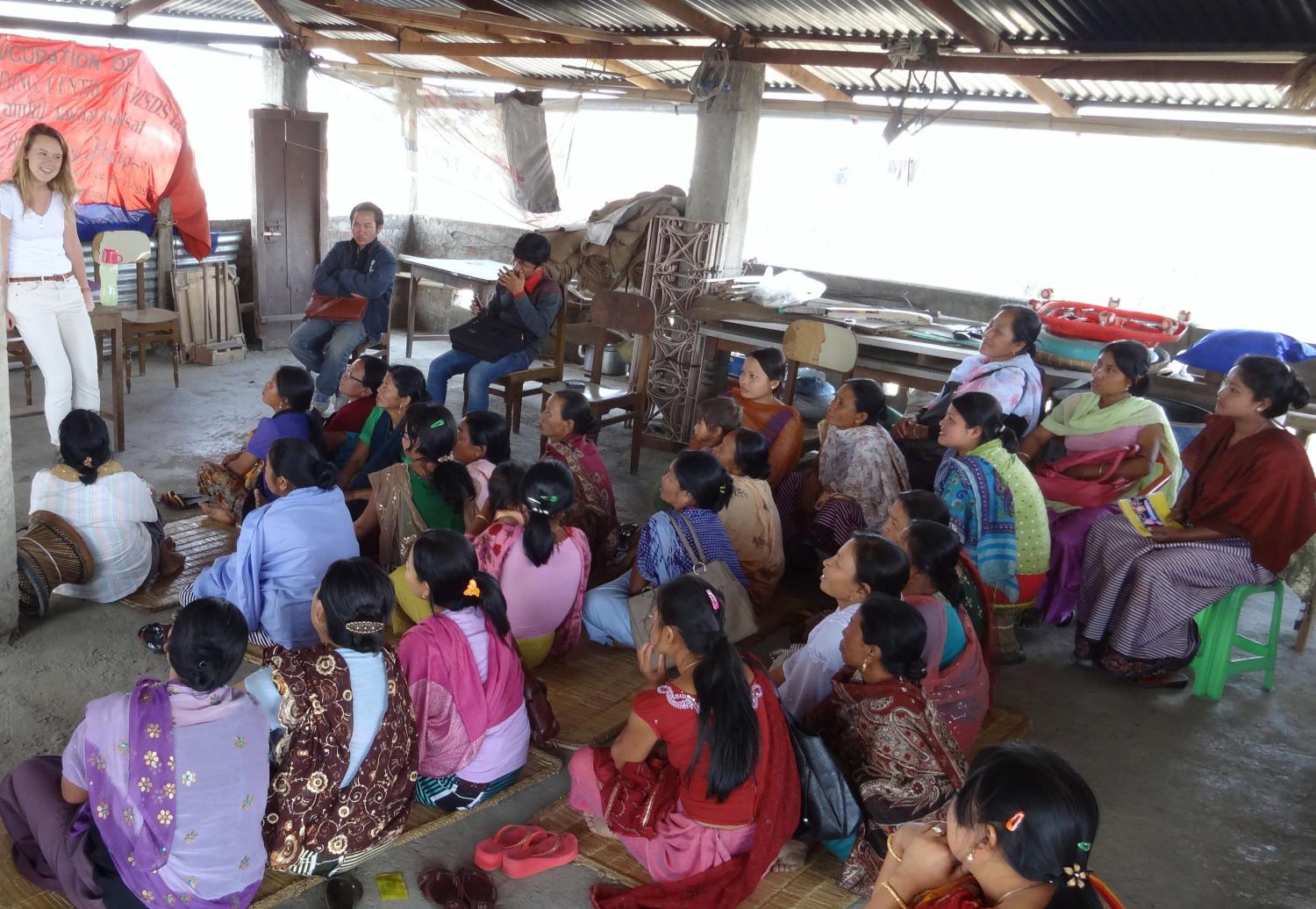 Monthly loan disbursements happen wherever convenient; in this case, borrower groups from 3 branch offices came together to the roof of the WSDS Head Office for financial training as well as loan disbursement. Stasi, WSDS, India