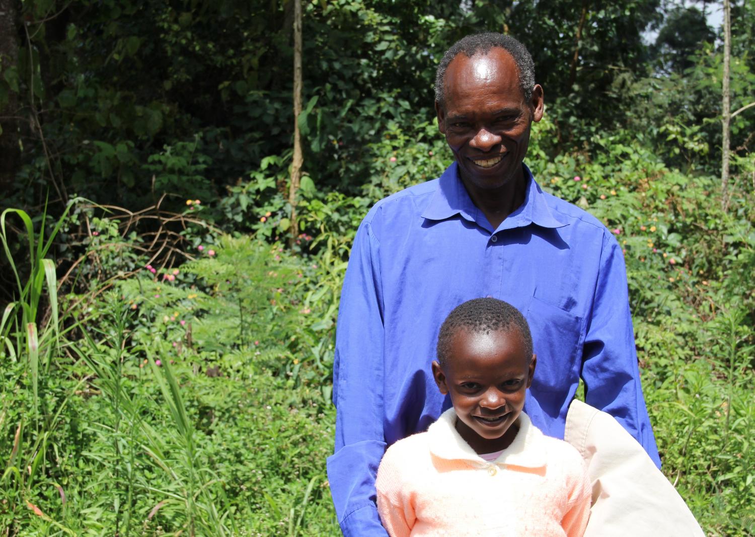 A proud Kiva Zip borrower and his son in Thika, Kenya. Shaherose, Kenya