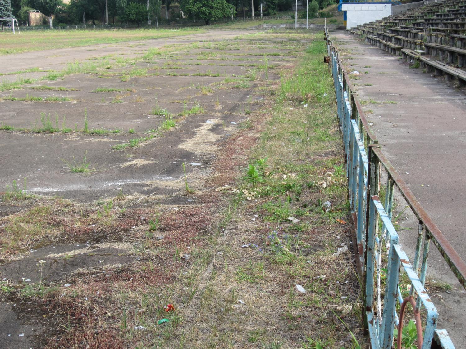 The remains of a stadium and asphalt track in Kiev. It used to be operated by the massive Radio Factory nearby, where most people in the area worked during the Soviet period