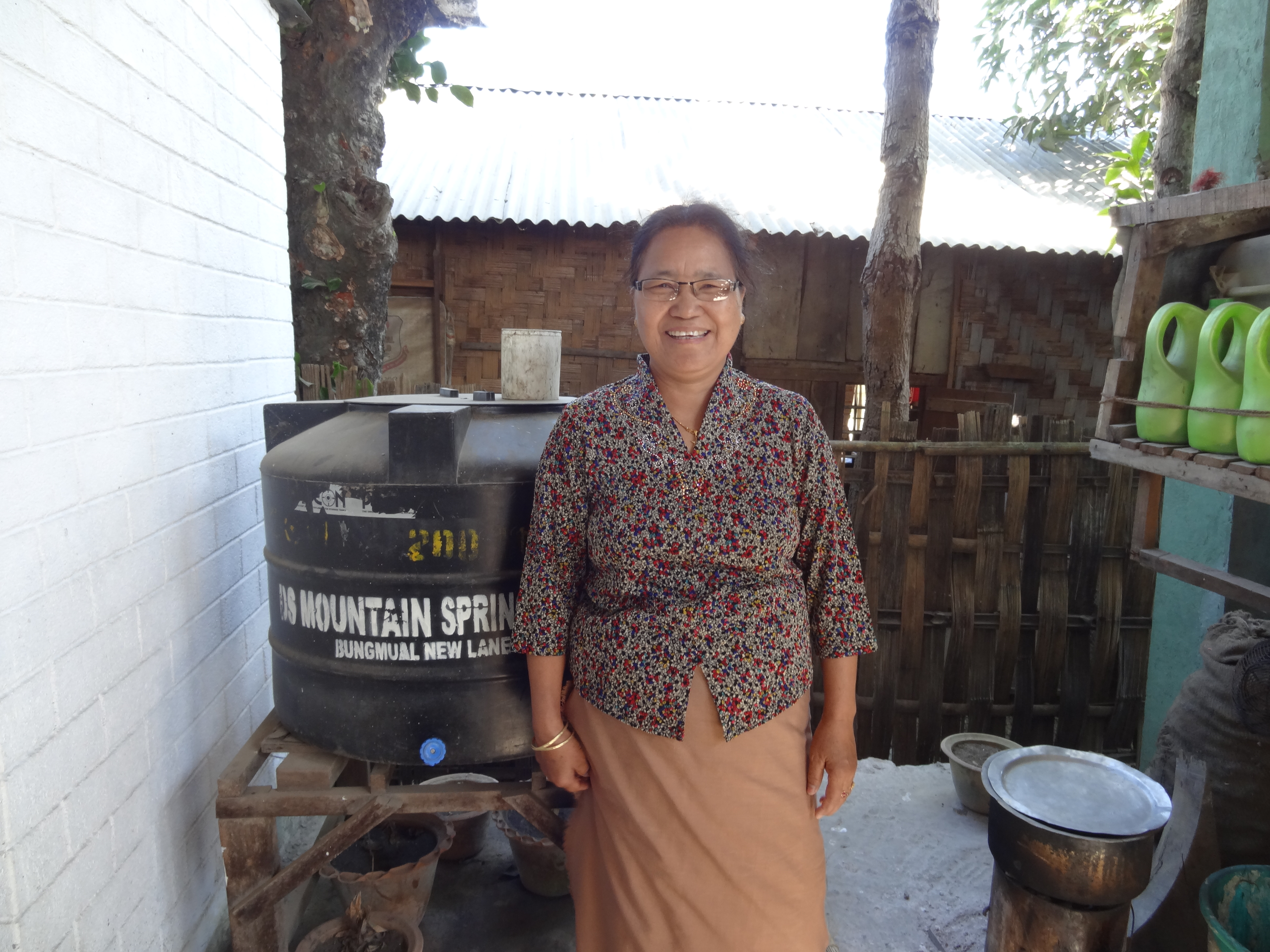 Thengkhawm and the mineral water she sells by the liter