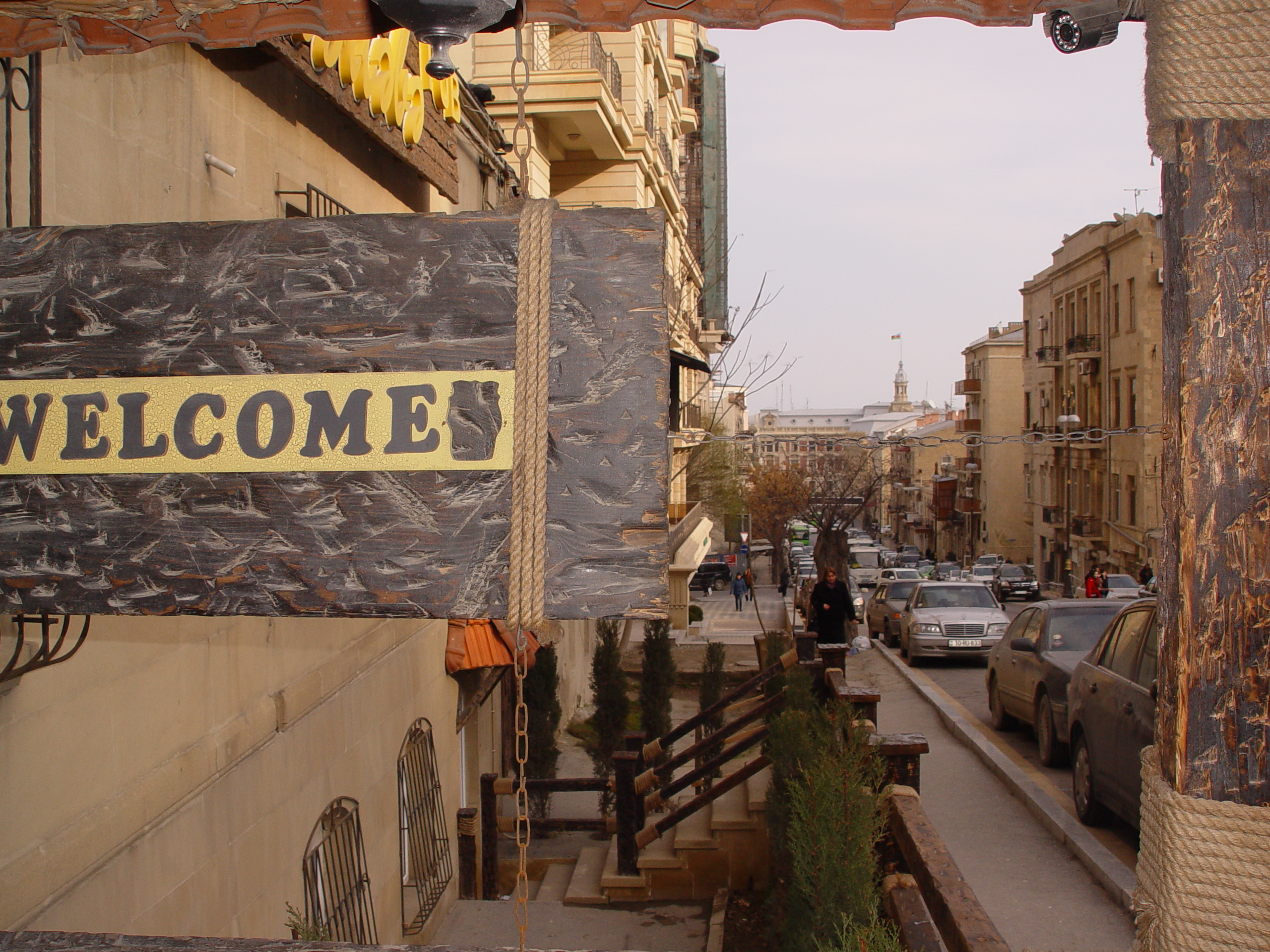 Downtown Baku with flag flying high over Executive Branch building.