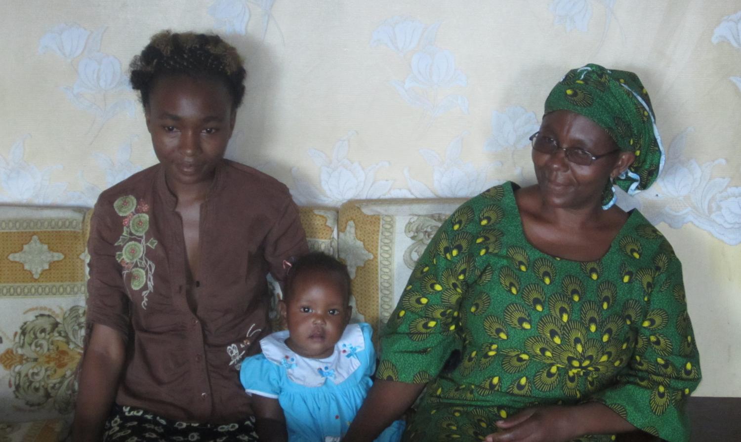 Mary with her daughter and granddaughter at their home in Bumala.