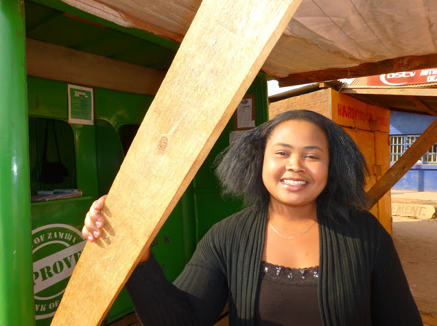 Angela outside her Zoona kiosk