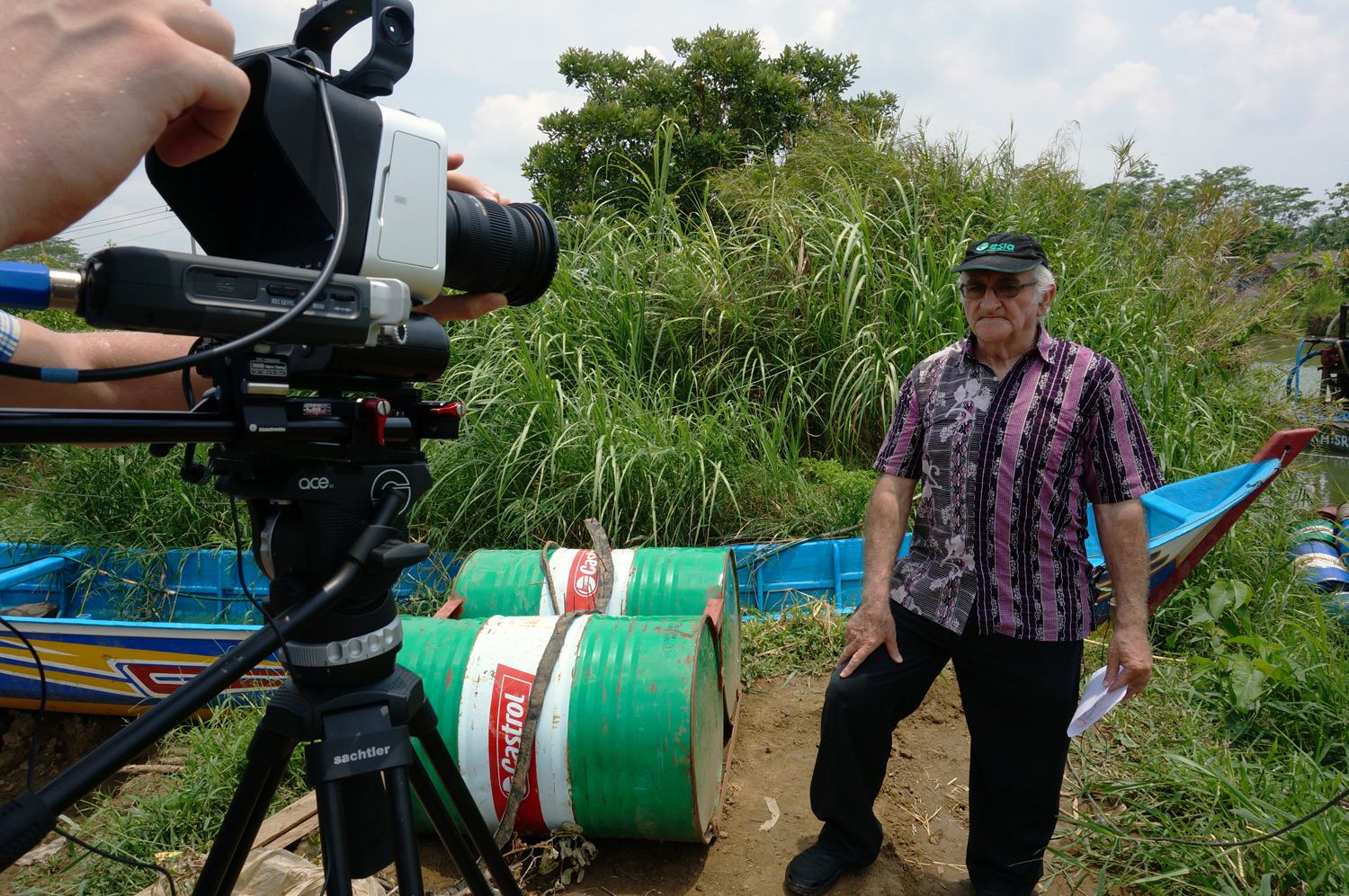 Filming Father Charlie's interview. Photo credit: Yungkit