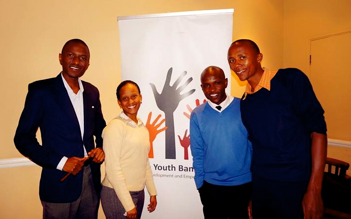 Youth Banner Staff (left to right: Clive Angwenyi, BEEP Program Manager; Ruth Ruhara, ATG Project Manager; Kevin Kisali, Financial Linkages Project Manager; Kenneth Karuri, Training Project Manager
