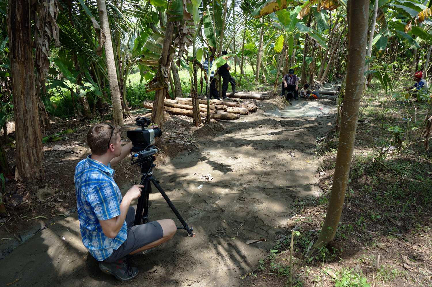 Mike filming the pipe from the water pump. Photo credit: Yungkit