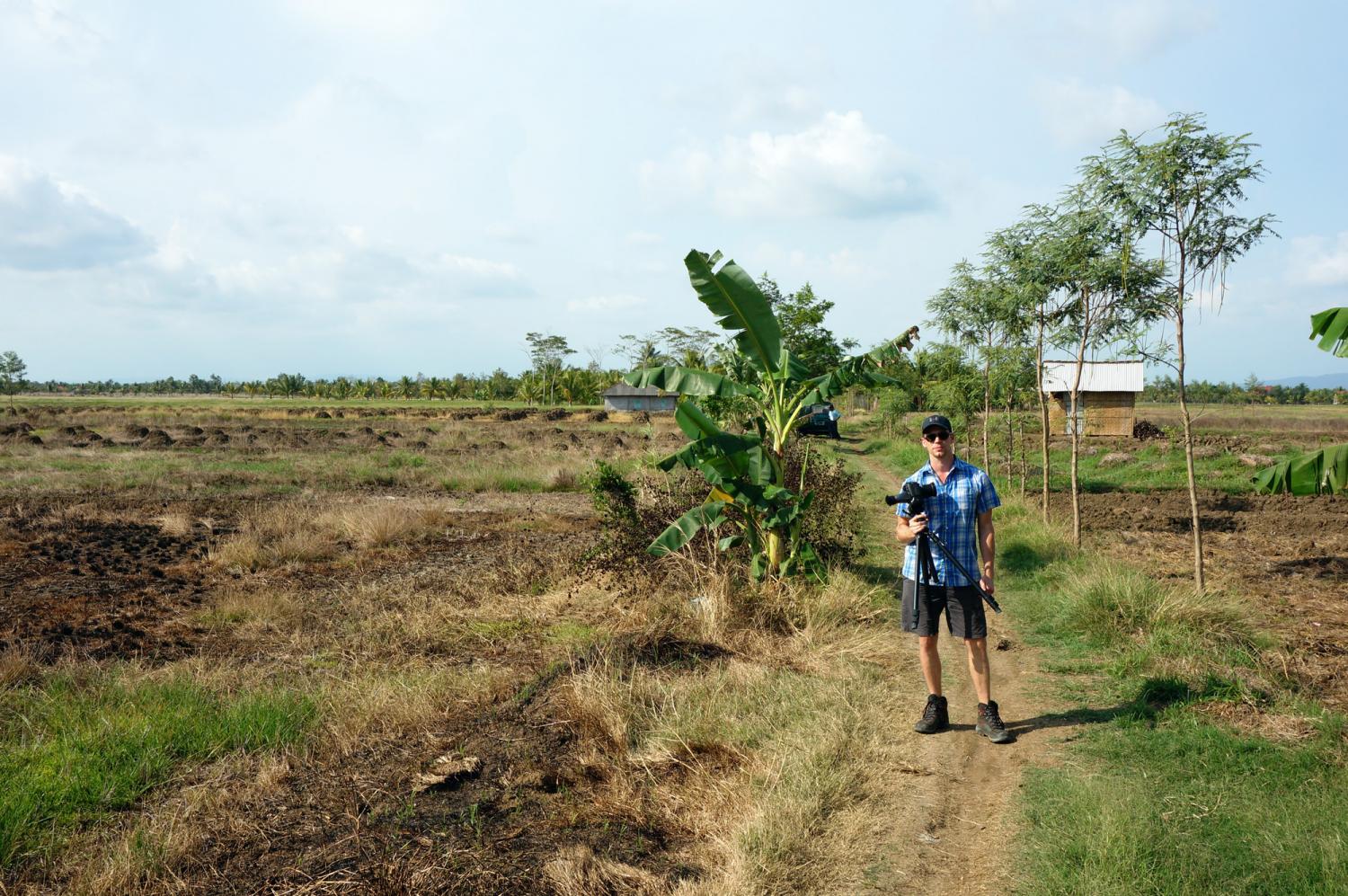 Mike in the field (this land was previously all under water). Photo credit: Yungkit