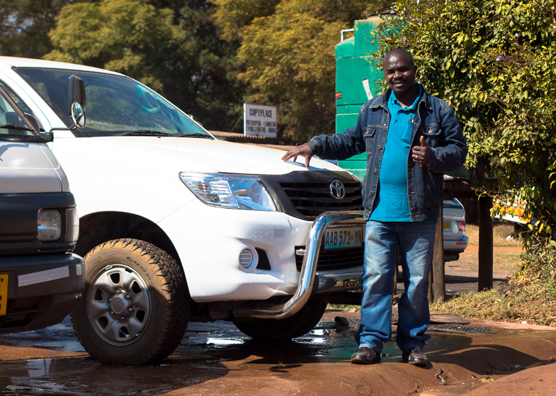 Here is Jabulani, infront of the car of his client from Mozambique!