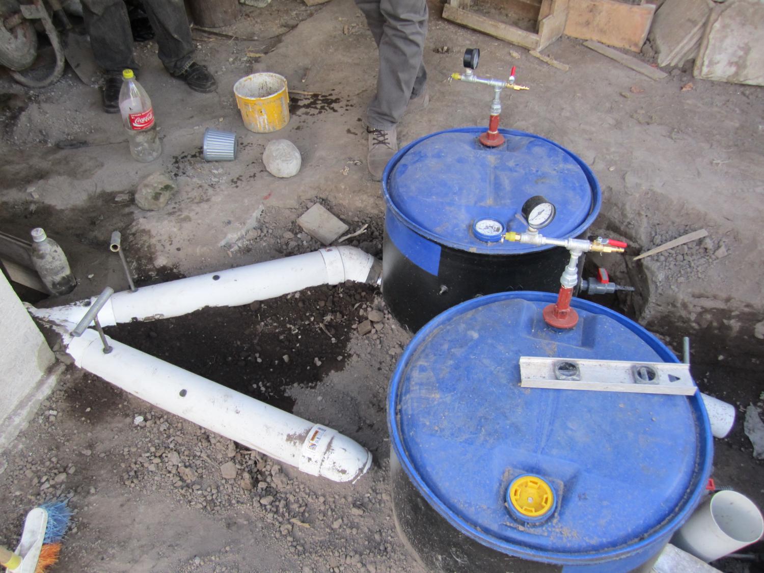 Two biodigester barrels are used for the project so that while one is filled to capacity for the gases and fertilizer to be used, the other one can continue to collect the waste. It is an easy process to switch from one barrel to the other.