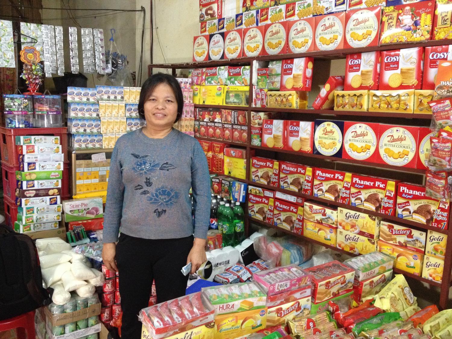 Mrs. Nhấn and her shop