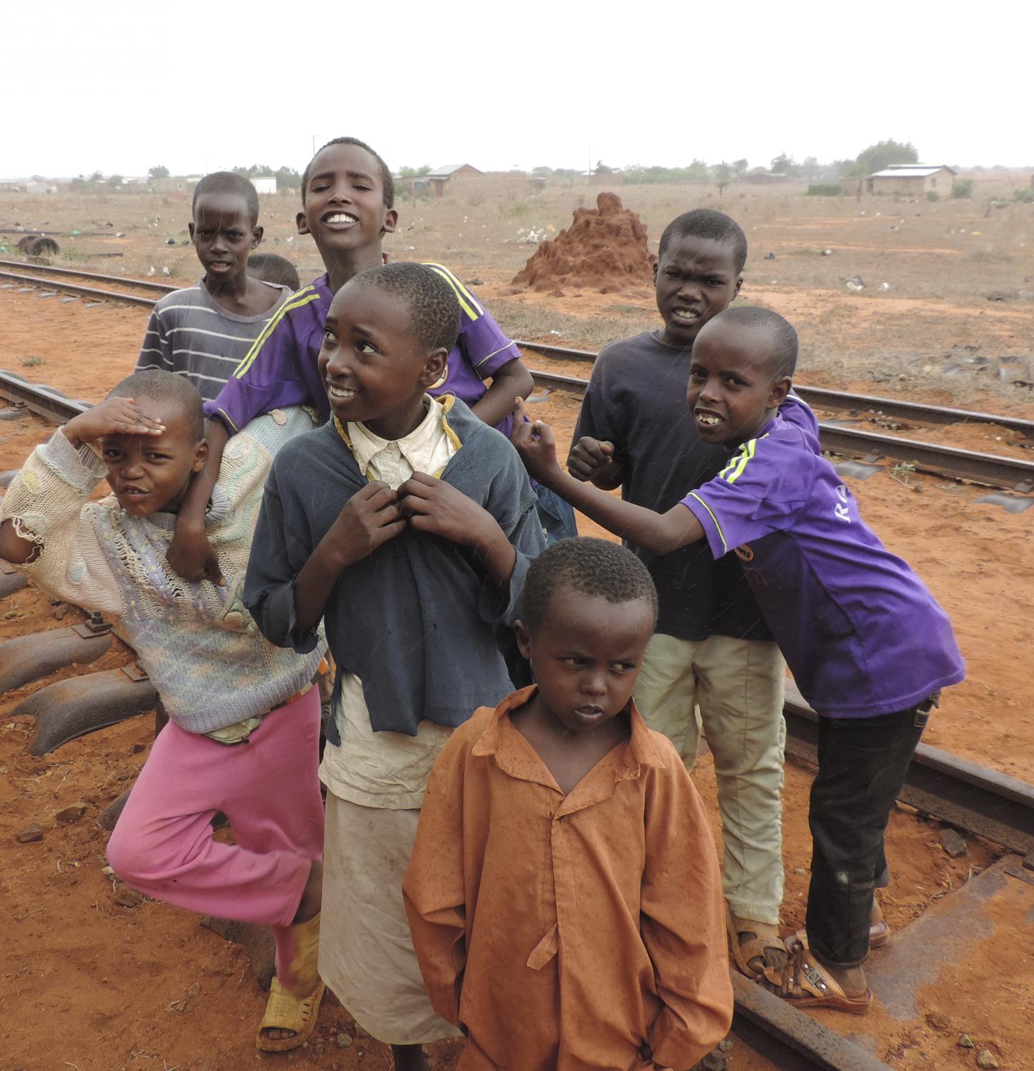 Kids playing on the tracks