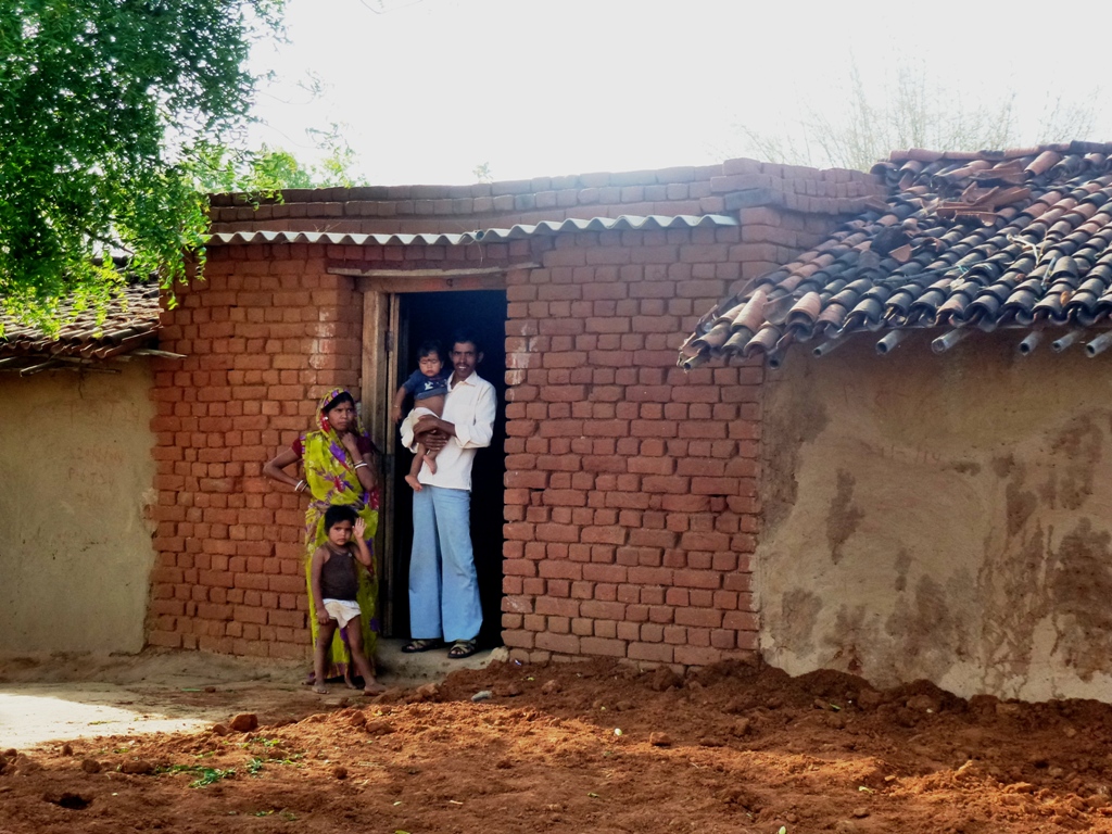 Family from Parandih at their door’s house