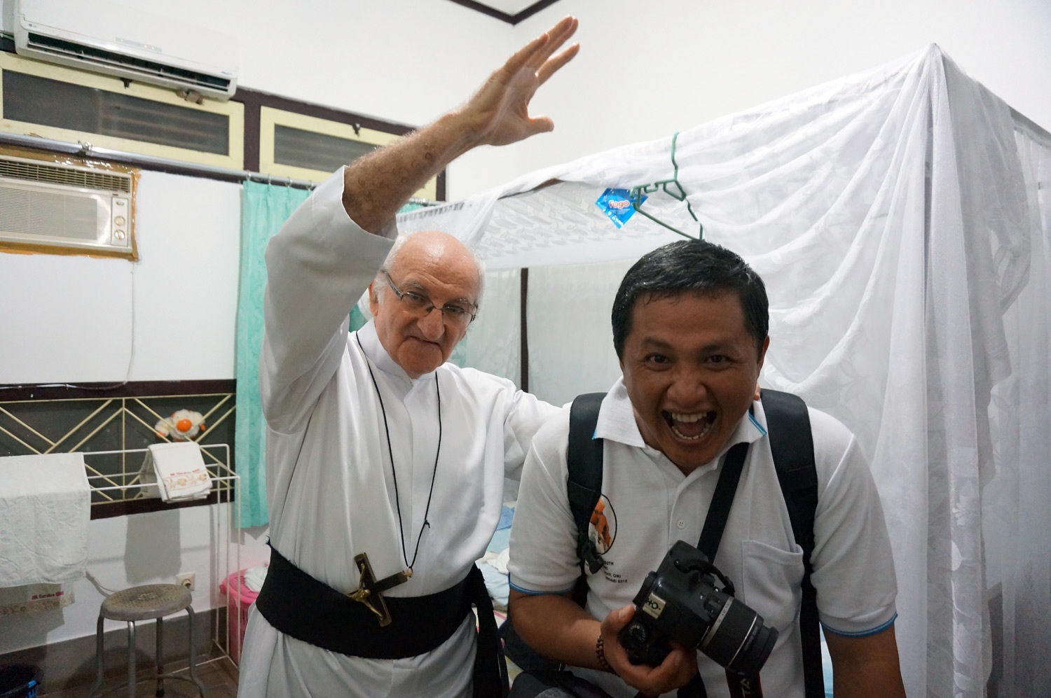 Father Charlie kidding around with us. Haha. Photo credit: Yungkit