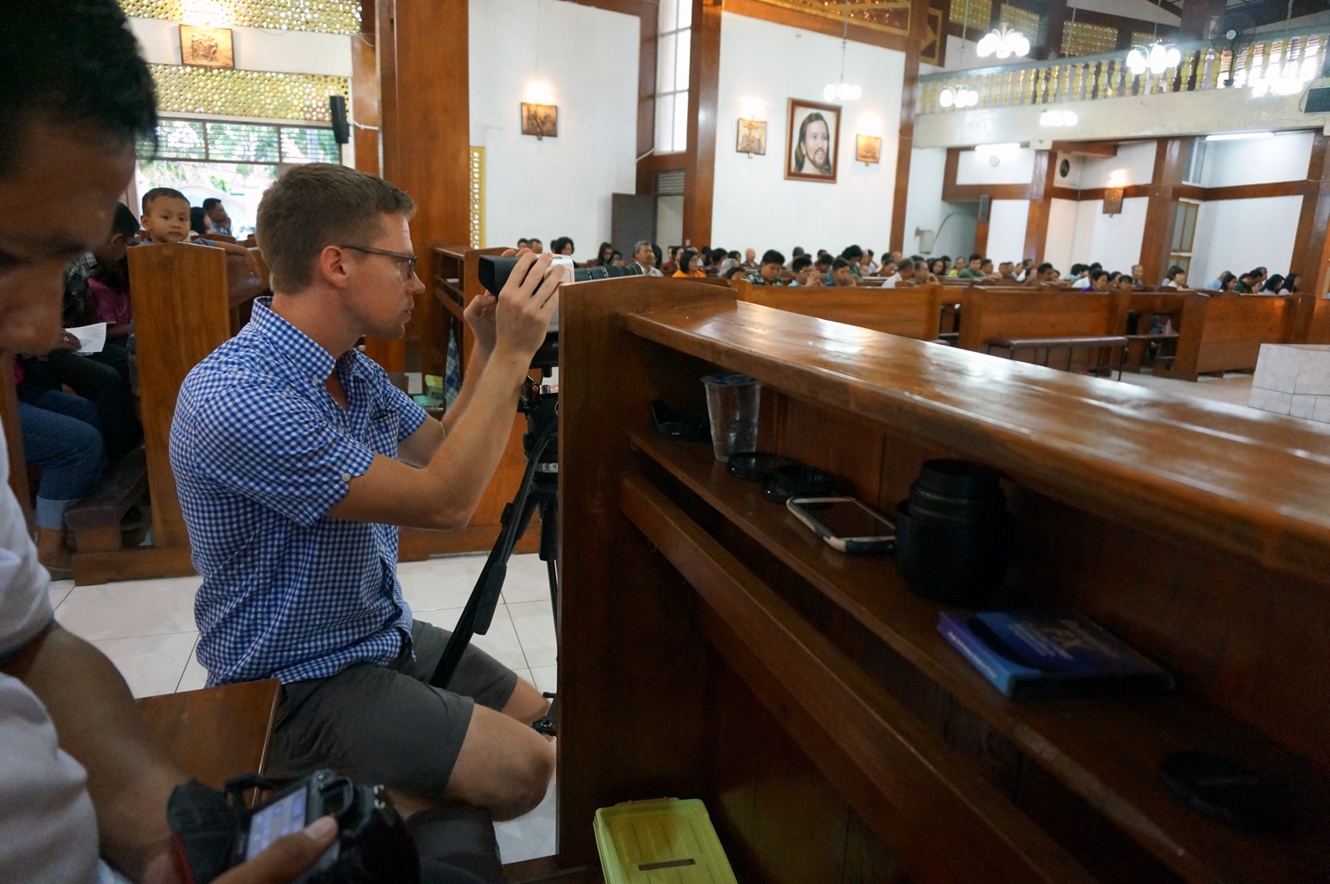 Filming in church. Photo credit: Yungkit