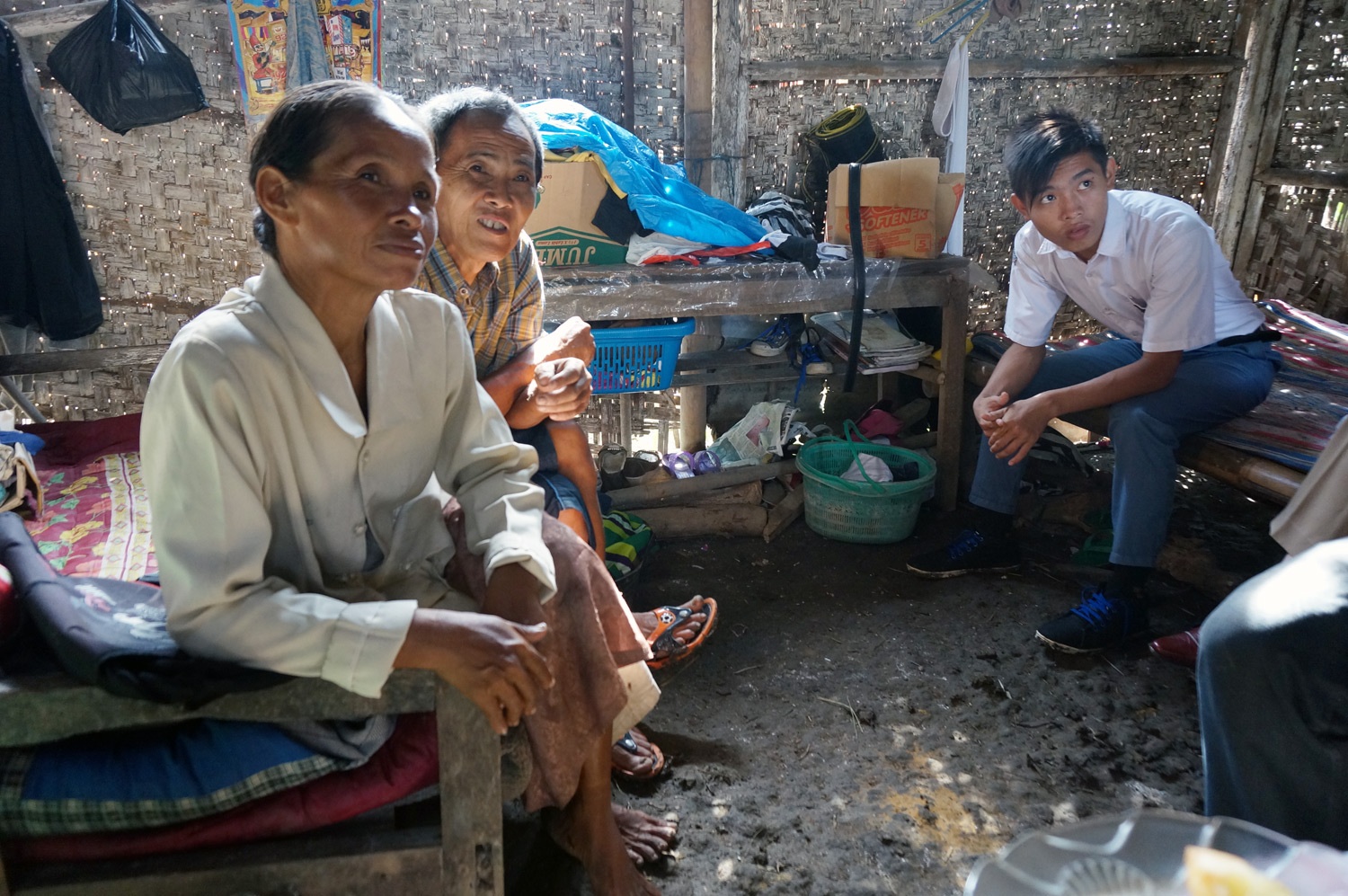 Paulos and his family inside their home. One of the two bedrooms. Photo credit: Yungkit
