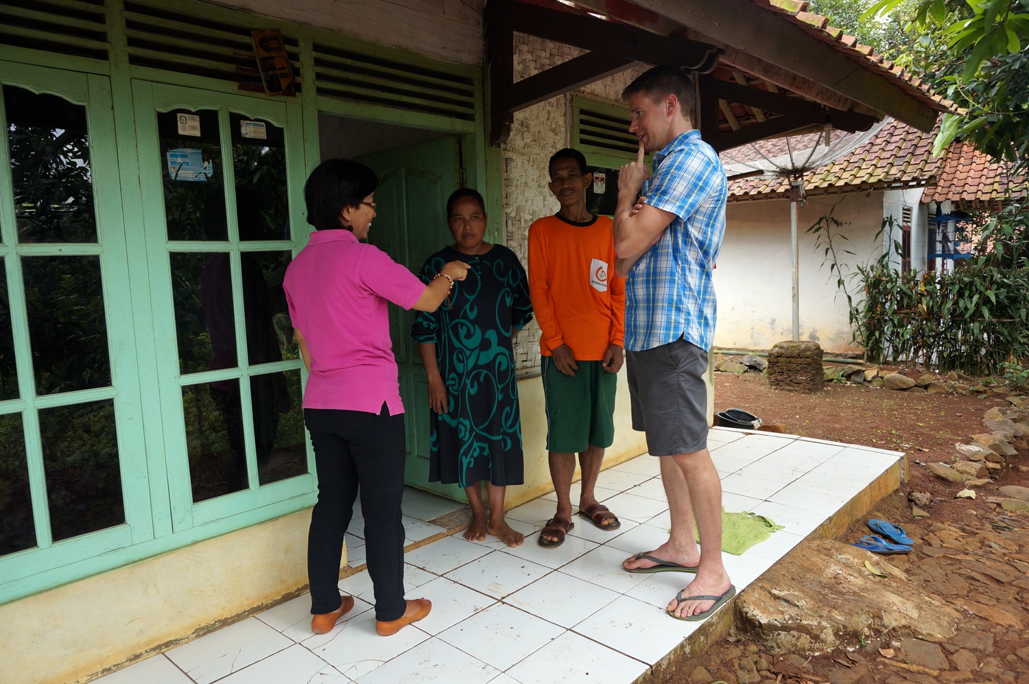 Directing the family with the help of Christina's translations. Photo credit: Yungkit