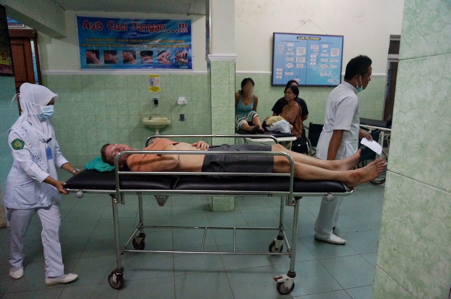 Passed out after they put my shoulder back in place and Christina was laughing. Har har har. Photo credit: Yungkit