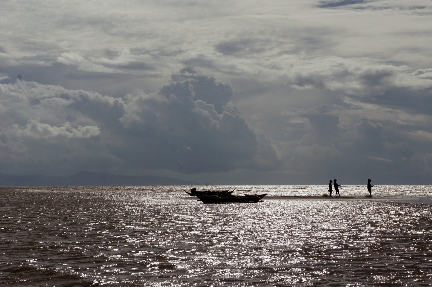 Client's crew fishing in the distance. Photo credit: Yungkit