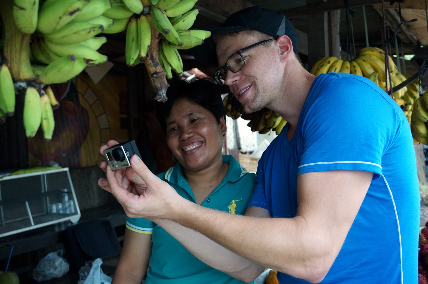 Showing the client the banana cam footage. Photo credit: Yungkit