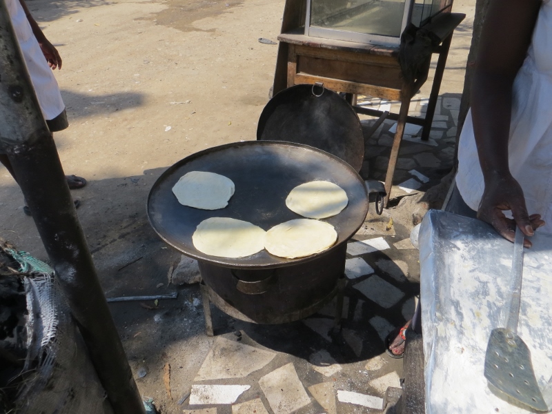 Making Chipatis - local breakfast of fried dough