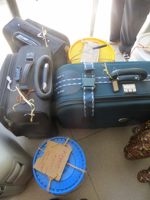 My bukcet of fish with other luggage