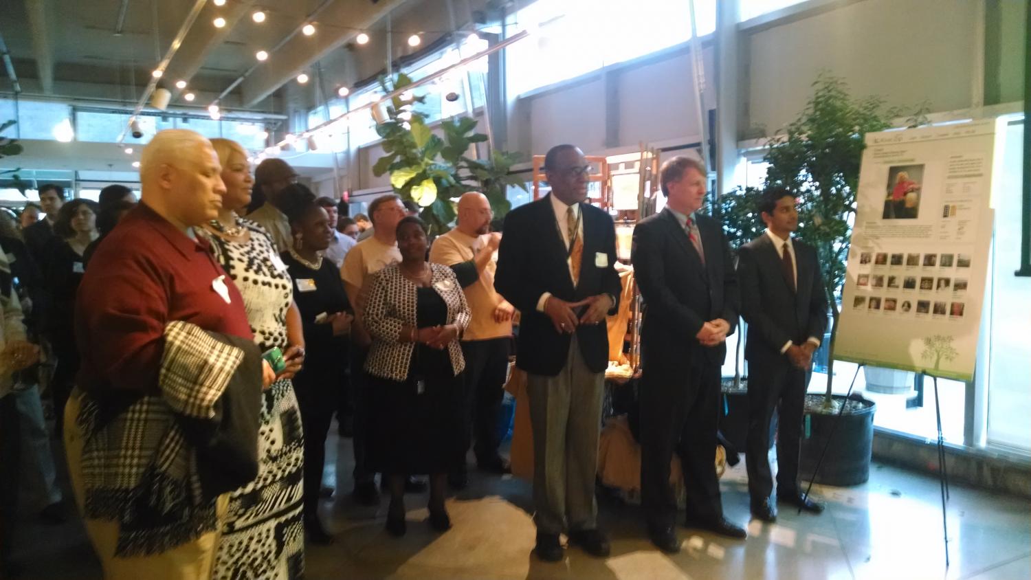 Dr. Curtiss E. Porter, County Executive Rich Fitzgerald, and Kiva President Premal Shah